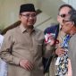 Foto Gus yakut keluar dari gedung merah putih KPK